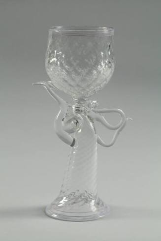 The cognac side of the goblet is shown in the picture on the top and the champagne side is show…